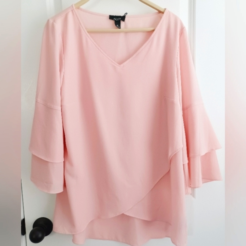 V neck  bell sleeved blouse.